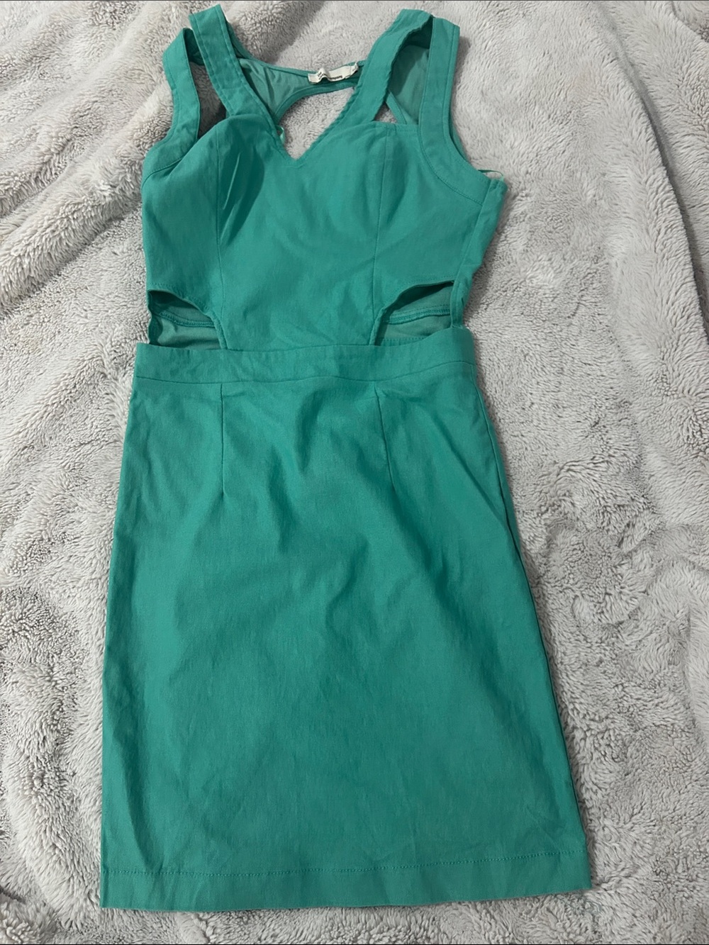 the clothing company Teal Cutout Sheath Dress